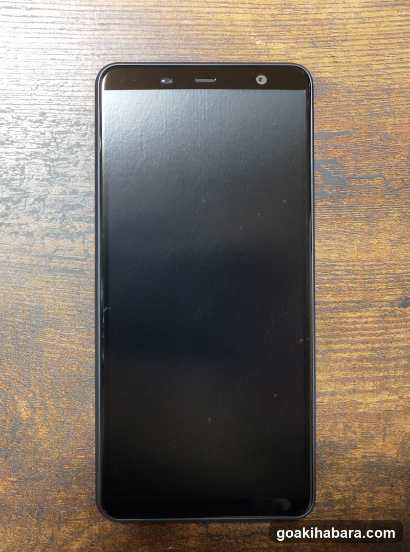 Smartphone on wooden surface