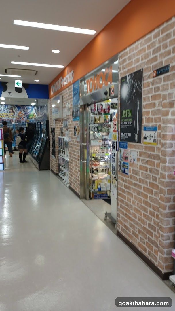 Interior of a store with brick wall and shop entrance