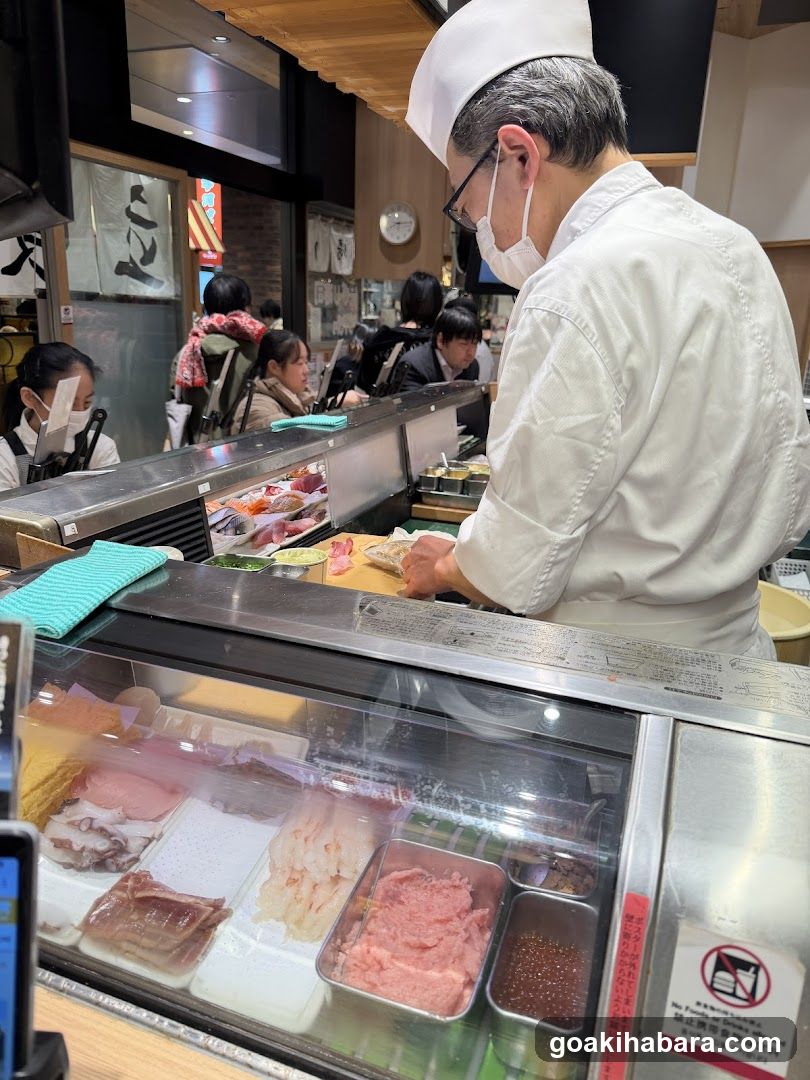 Sushi Chef Preparing Food