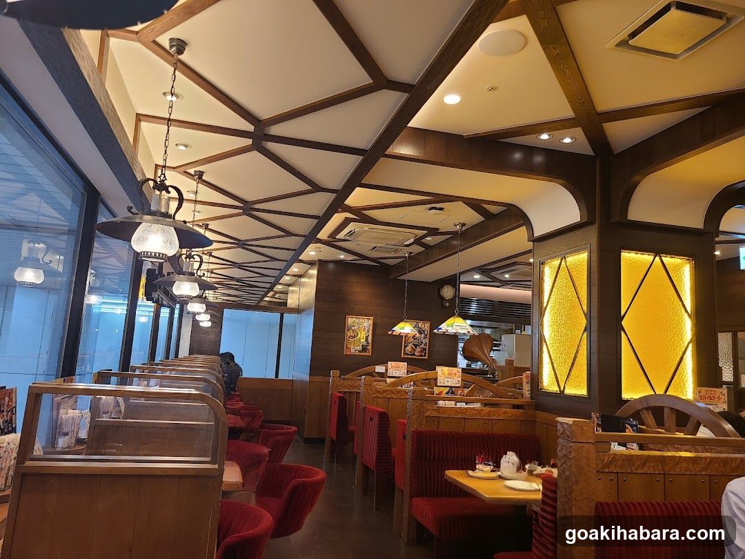 Restaurant Interior with Wooden Ceiling and Red Booths