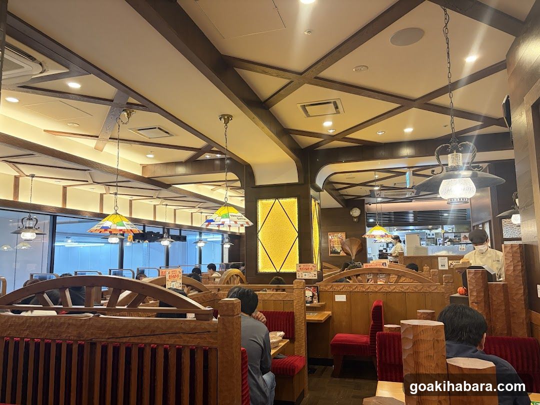 Restaurant Interior with Wooden Booths and Hanging Lights