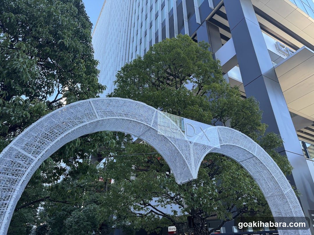 White Archway with Trees and Buildings