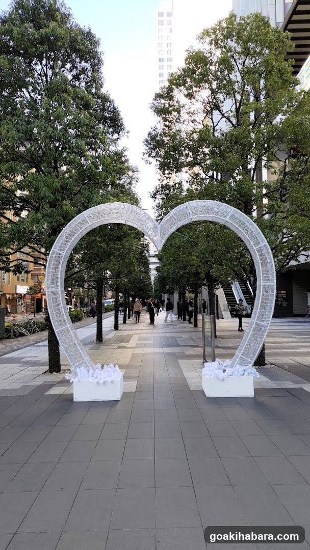Heart-shaped archway in urban plaza