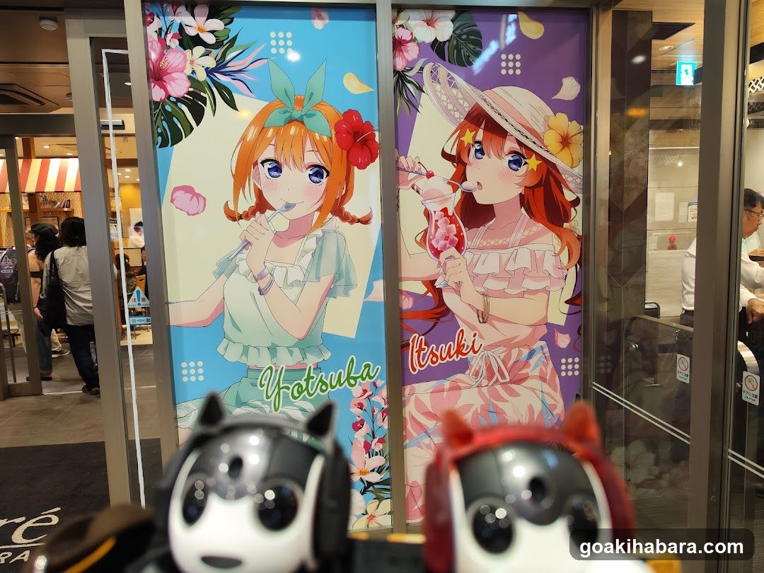 Anime Character Posters and Merchandise Display