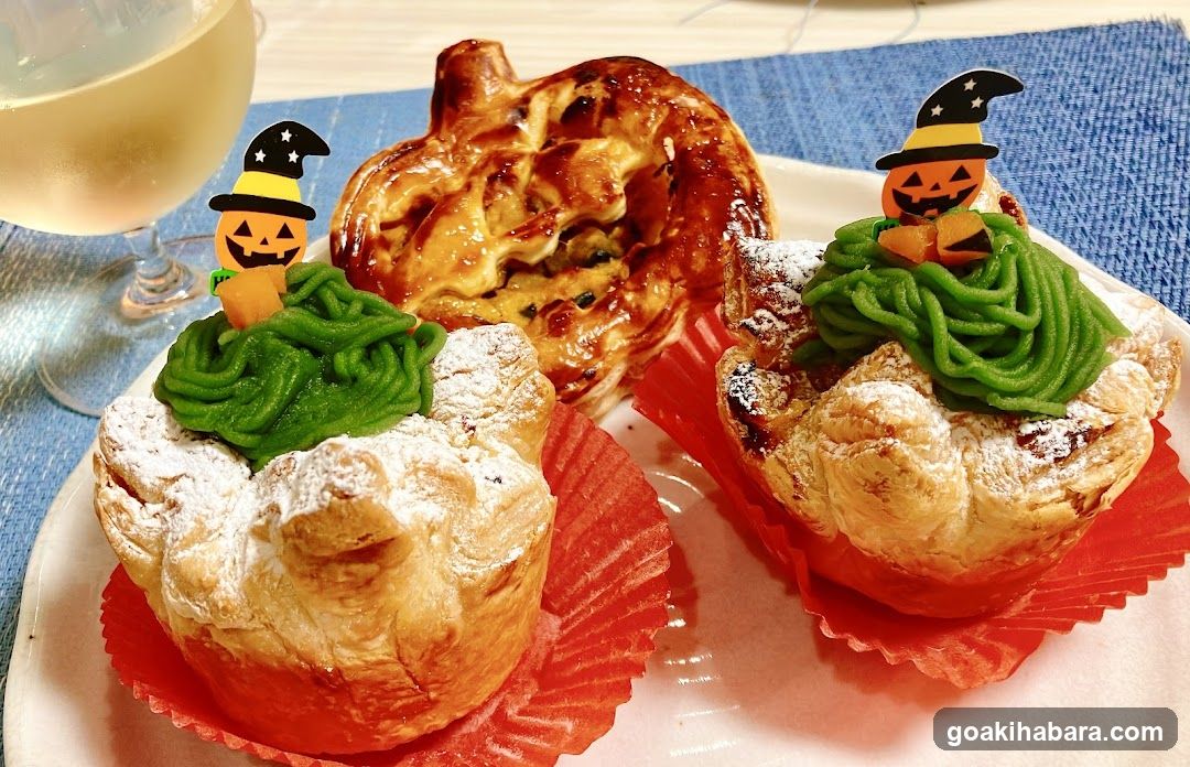 Halloween-themed pastries with jack-o'-lantern toppers