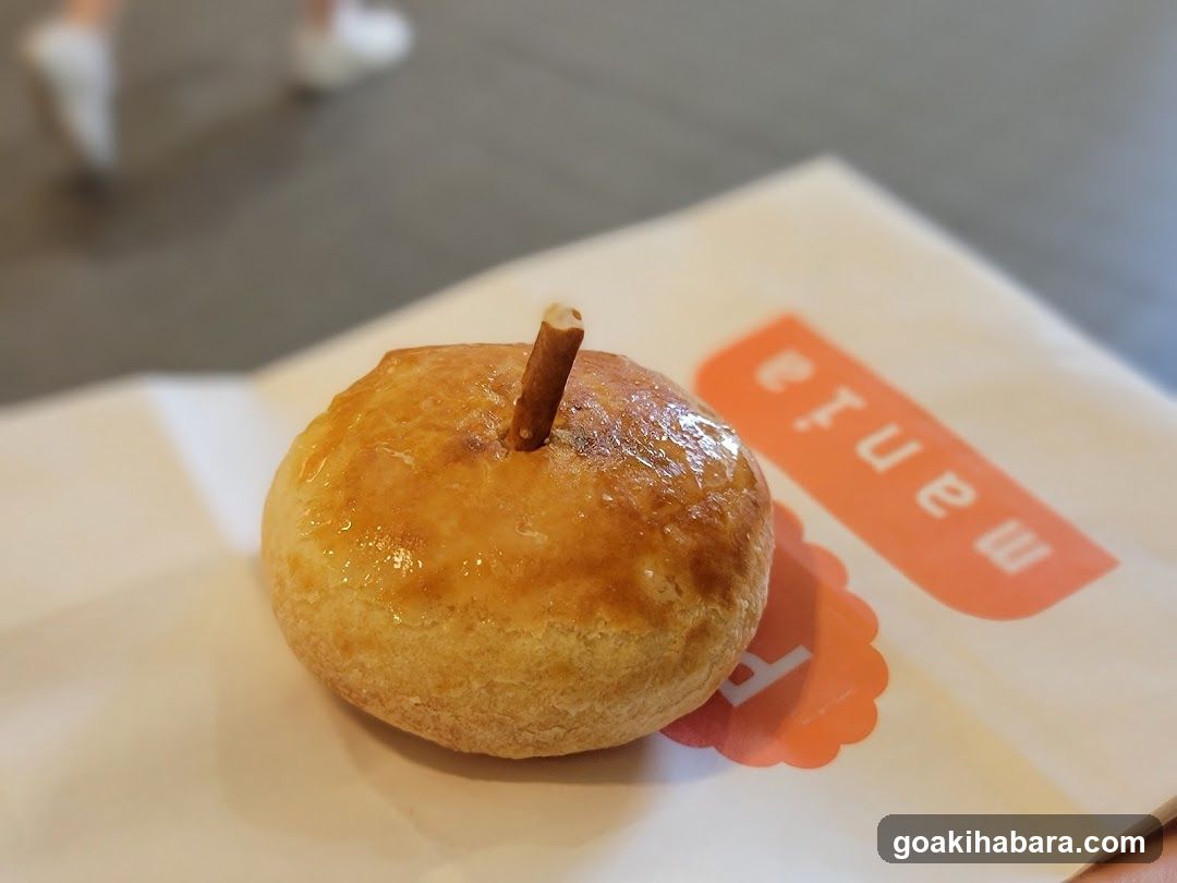 Pastry with Stick on Paper Wrapper