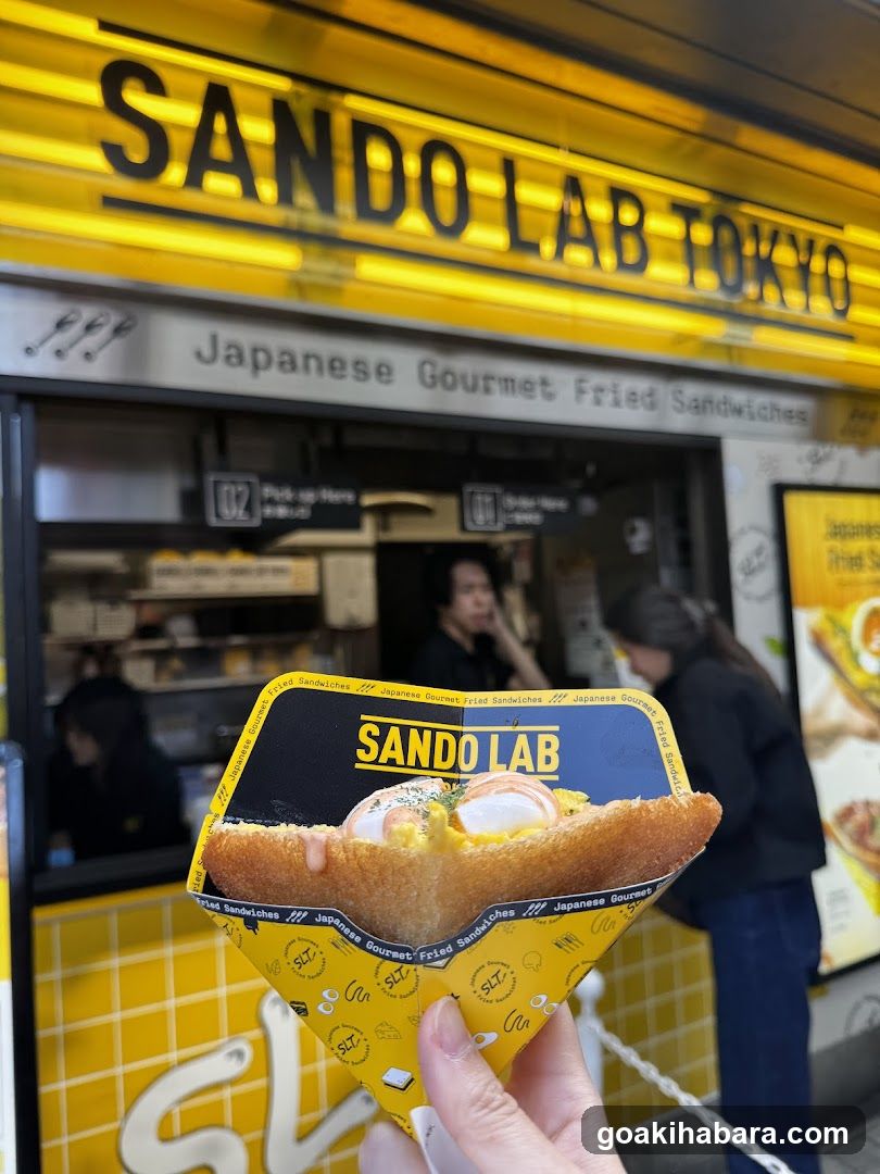 Sando Lab Tokyo storefront with fried sandwich in foreground