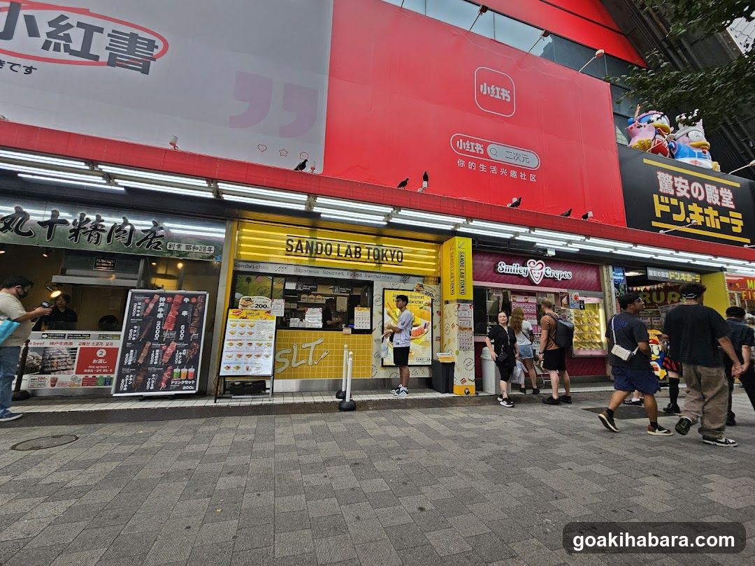 Street scene with shop fronts and signage