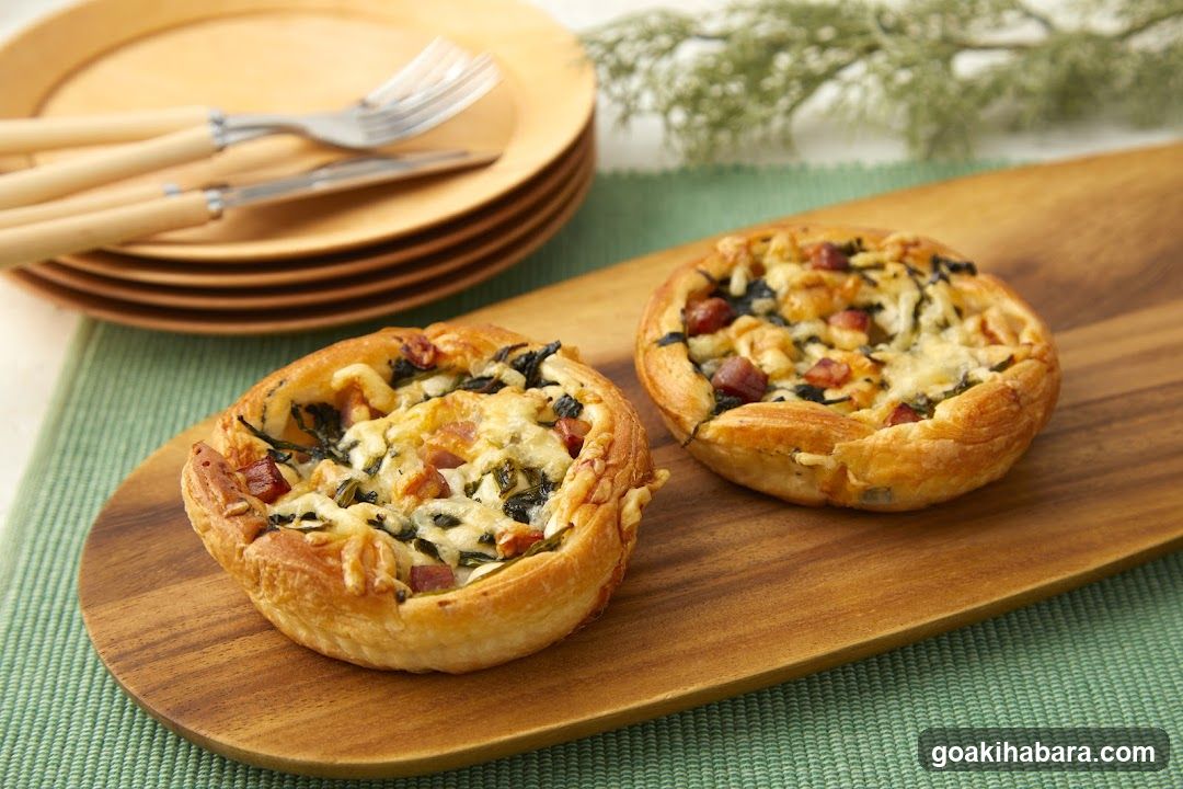 Savory Tartlets on Wooden Board