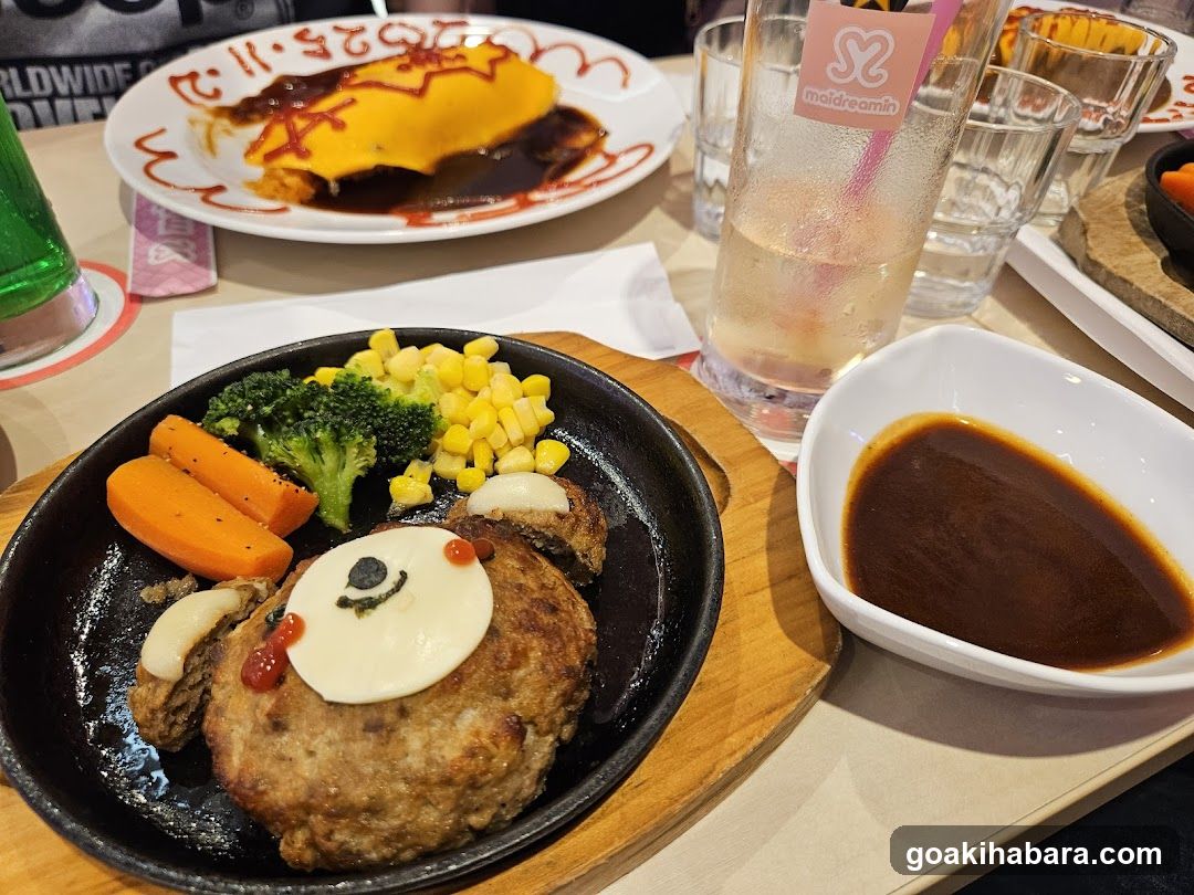 Sizzling Meatball with Side Dishes and Omelette