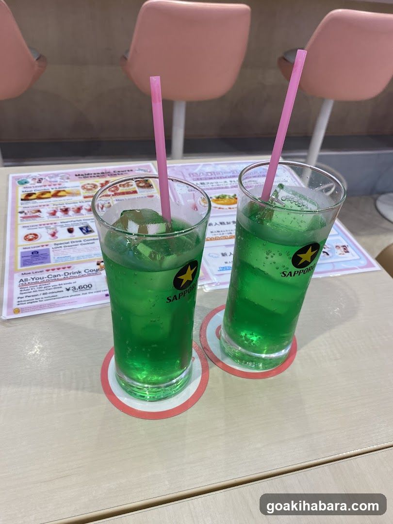 Green Sapporo Beer Drink with Pink Straws