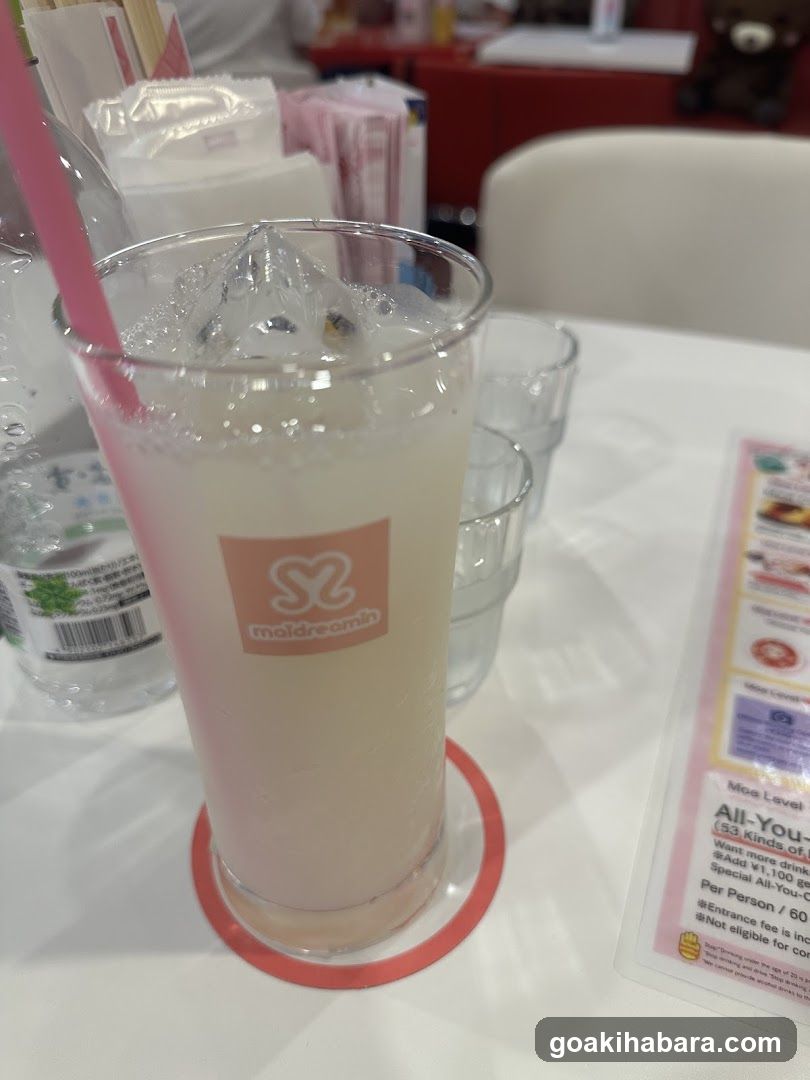 Drink with ice and straw on table
