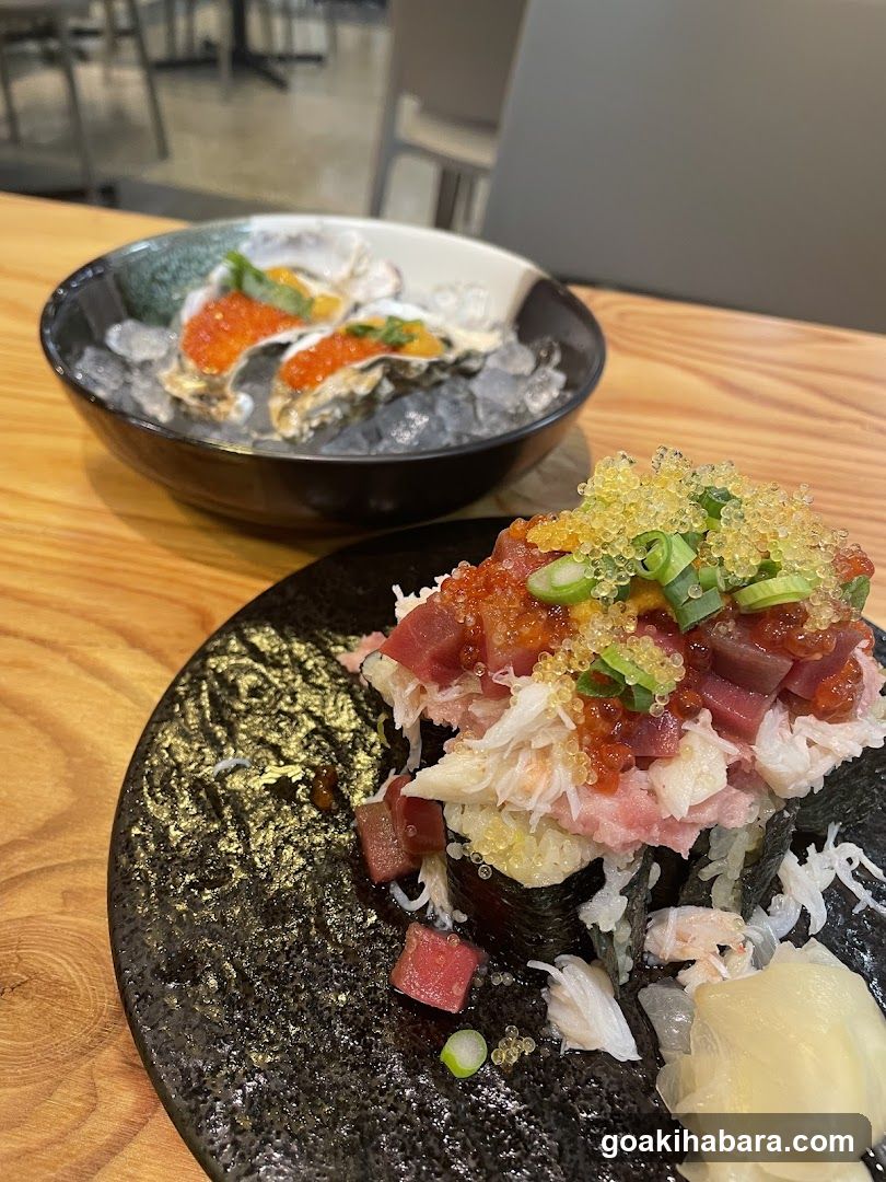Sushi and Oysters on a Wooden Table