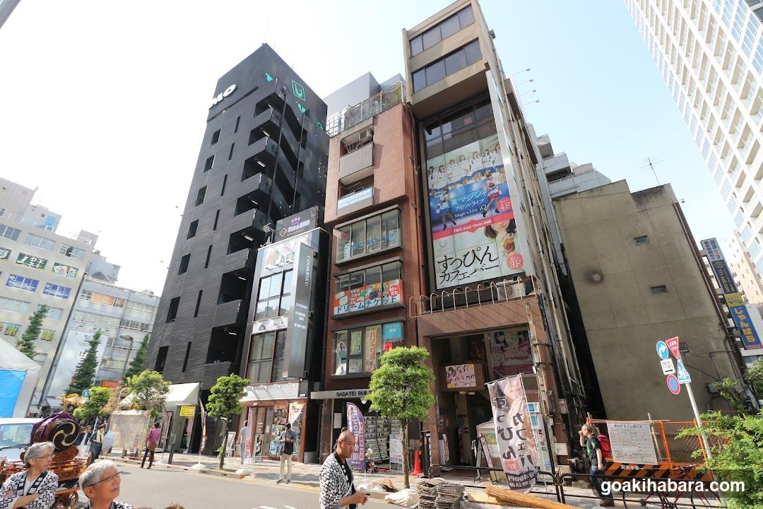 Urban Street Scene with Buildings and People
