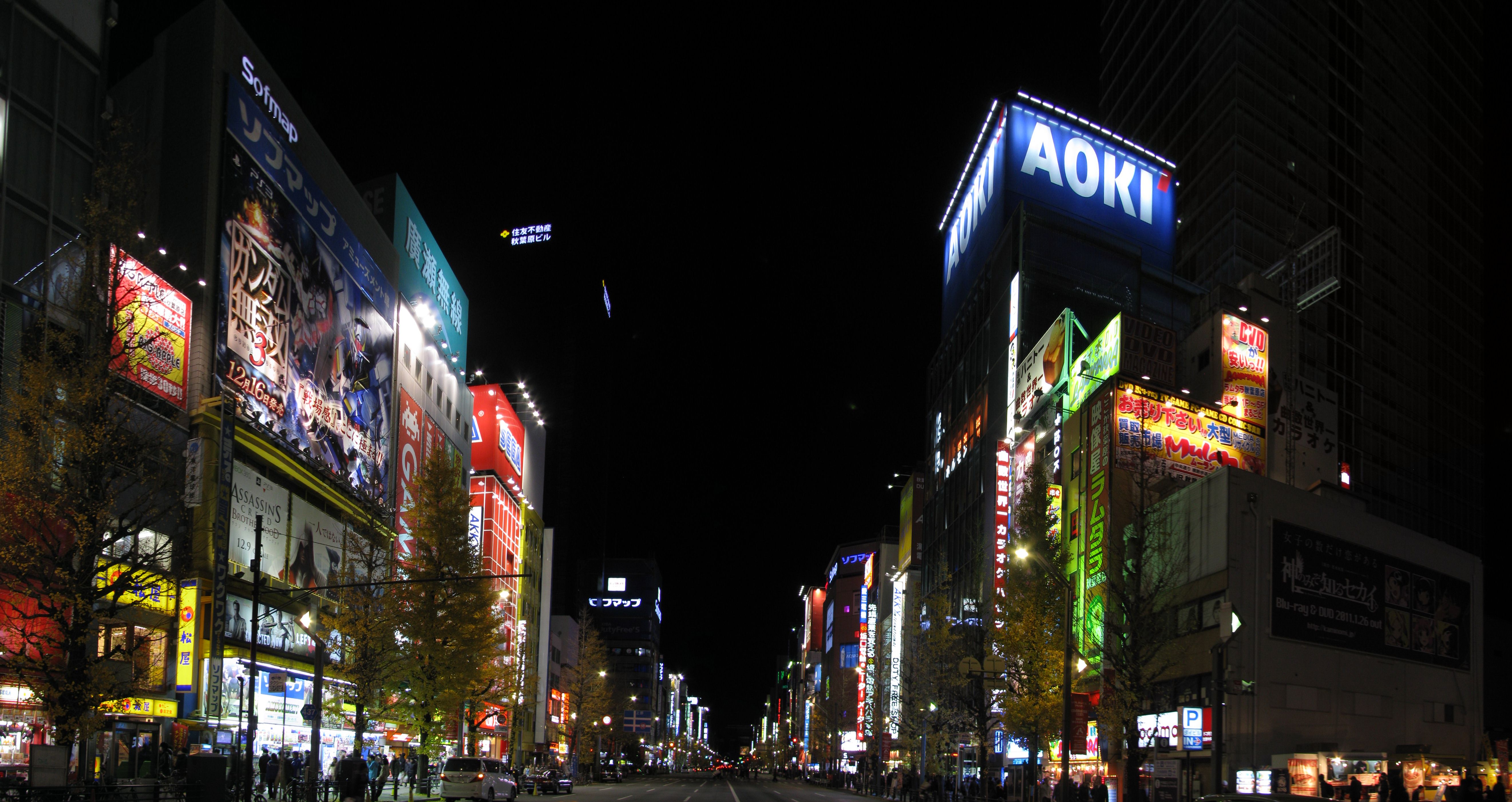 Akihabara streetscape where maid cafes are located among anime and electronics shops